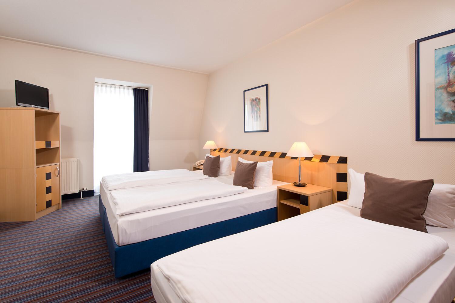 Business Dreibettzimmer